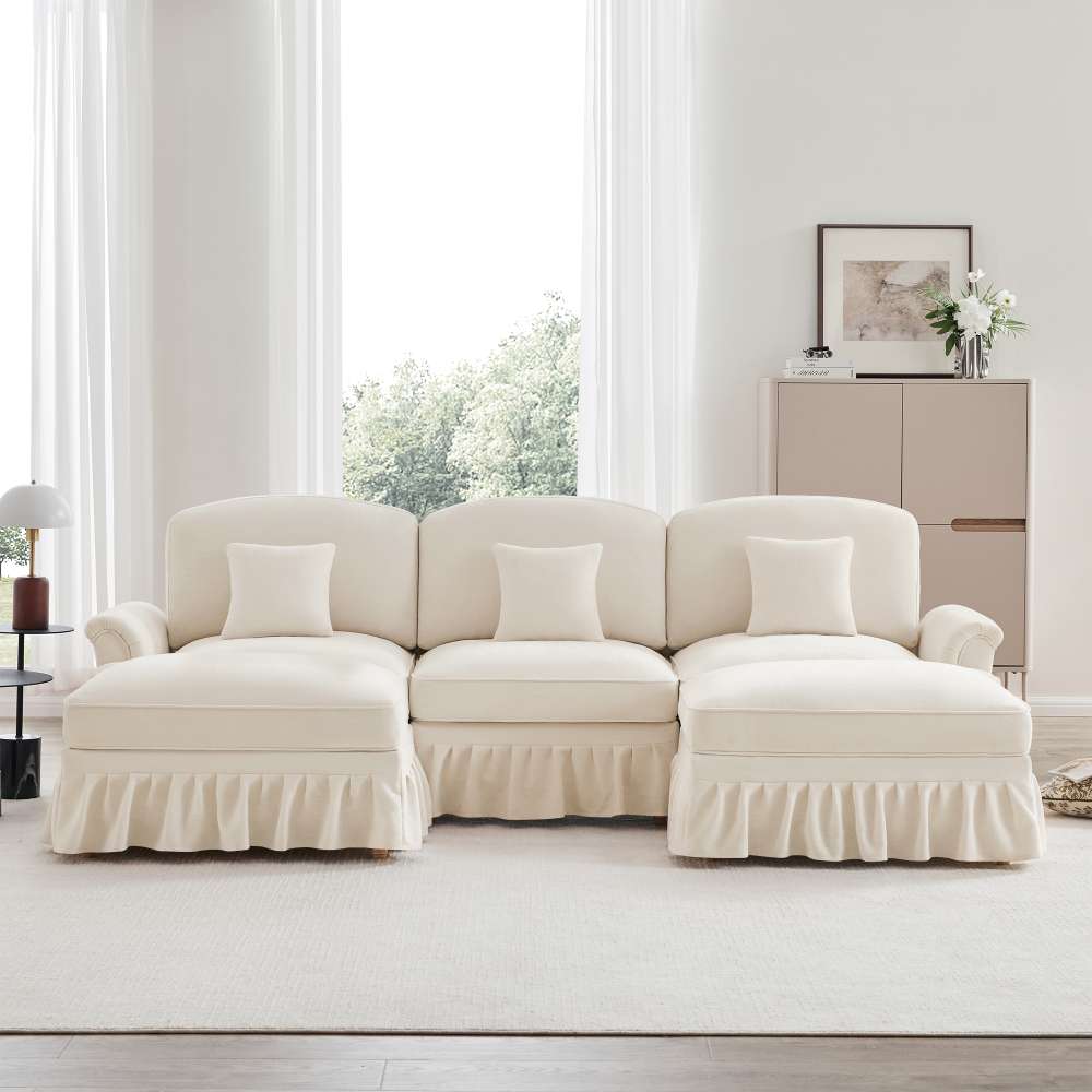 Modułowa sofa w kształcie U z podłokietnikami w kształcie trąbki, zdejmowanym pokrowcem i zwężanymi nóżkami