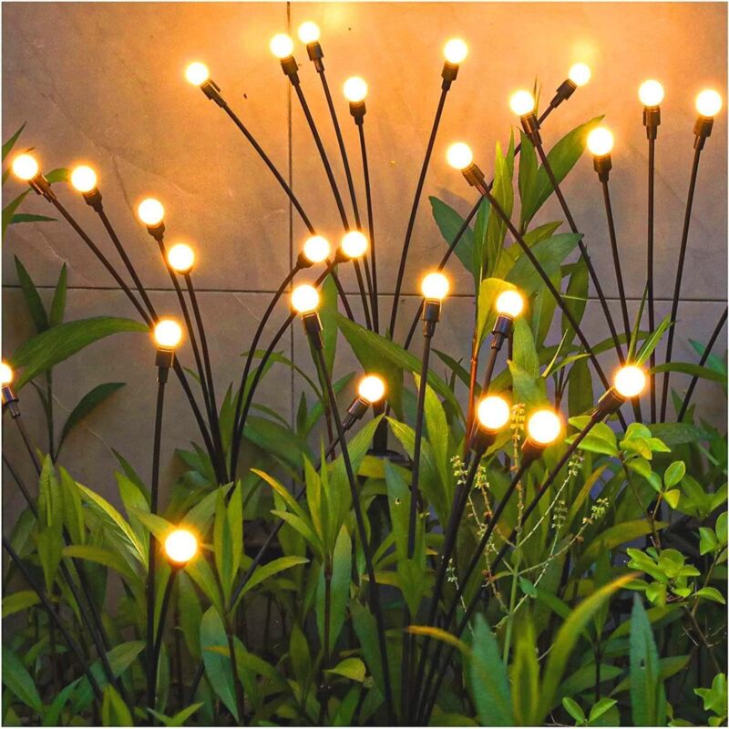 Wodoodporne solarne lampy zewnętrzne, zestaw 10 lampek LED, idealne do dekoracji tarasów i ogrodów.
