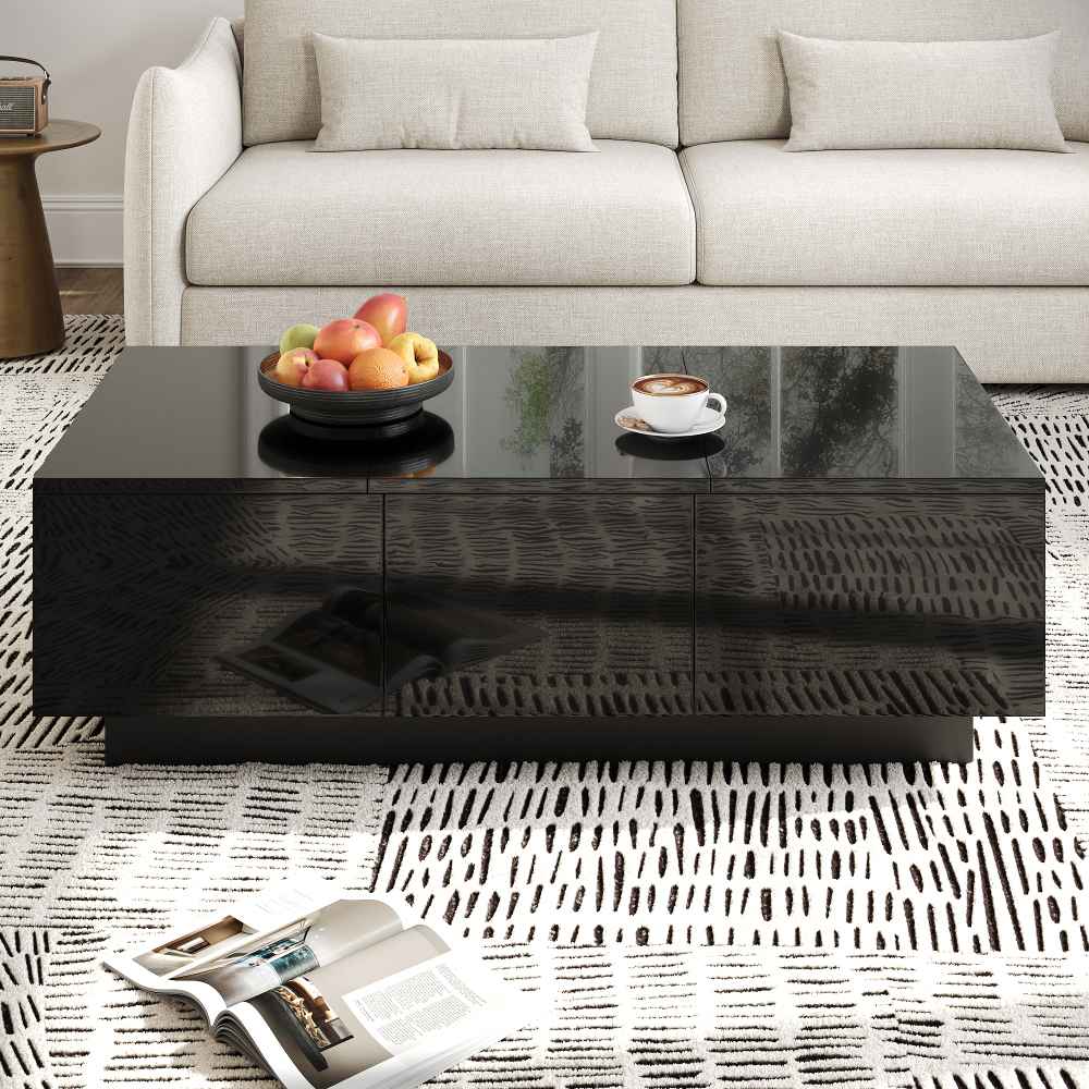 Nowoczesny, czarny lakierowany stolik kawowy z szufladami i wysuwanymi przegródkami, elegancki design, praktyczne miejsce do przechowywania
