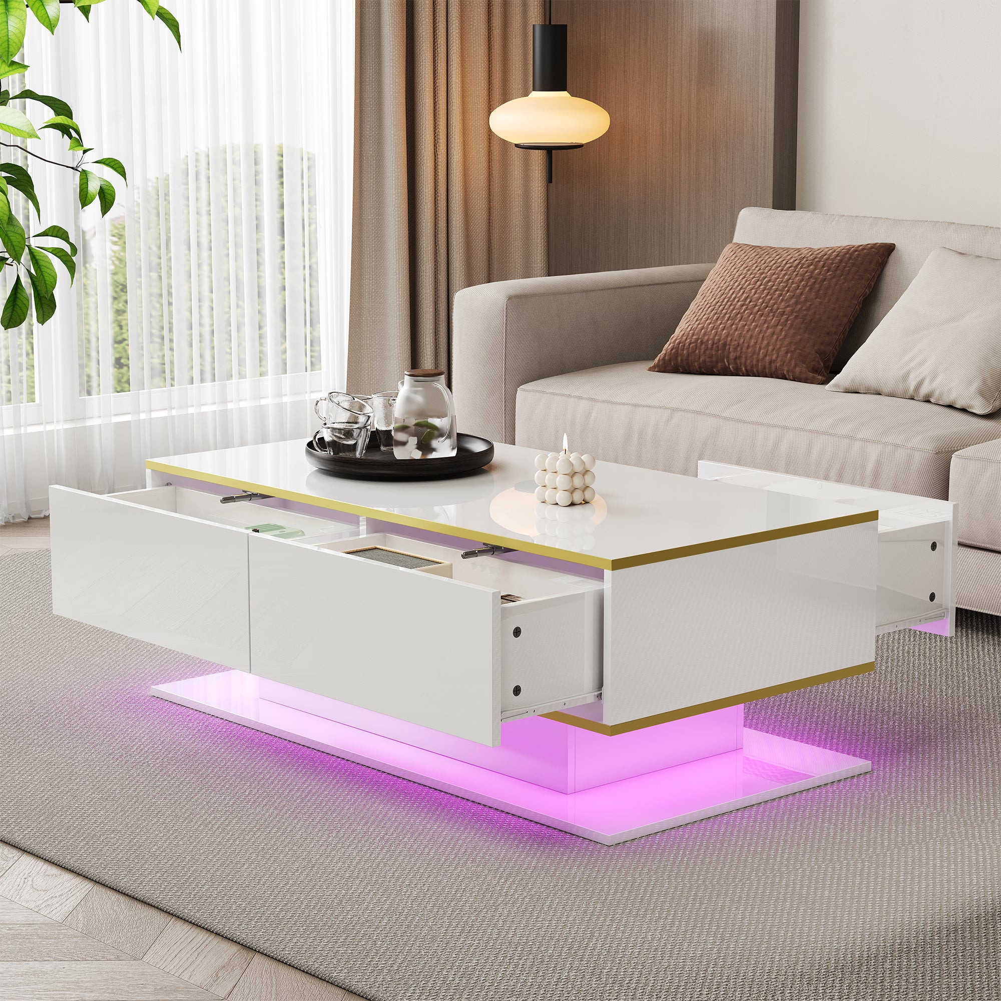 Nowoczesny stolik kawowy z połyskiem 100 x 50 x 40 cm - Oświetlenie LED - 3 szuflady i otwarte półki - Złote wykończenia - Biało-złoty