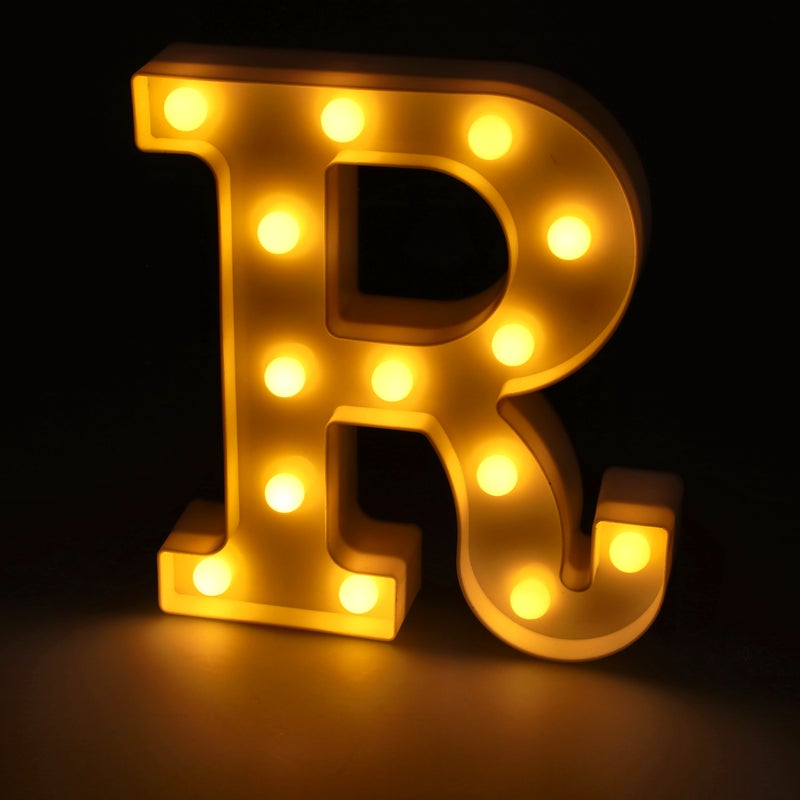 Litera LED "R" podświetlana ciepłym białym światłem, wysokość 22 cm, zasilanie bateryjne 2*AA