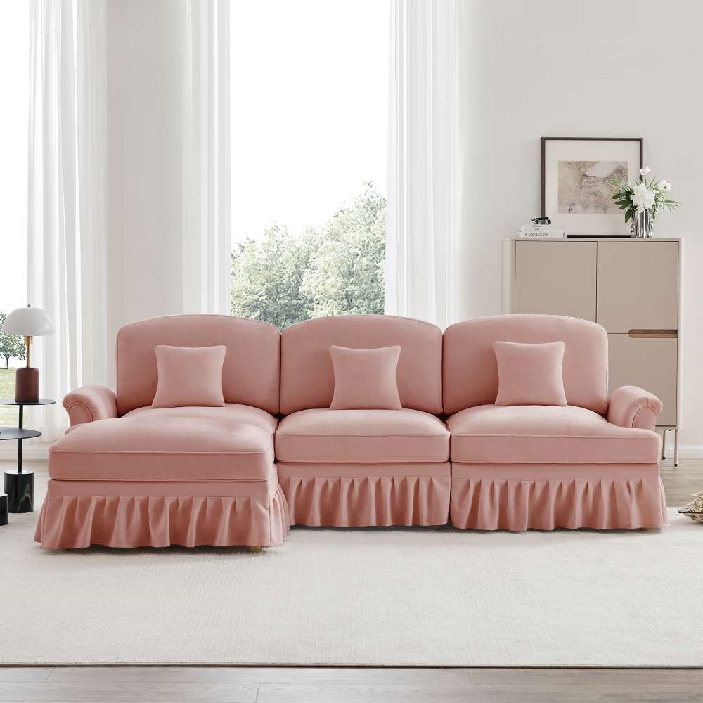 Modułowa sofa 3-osobowa w kształcie L, tapicerowana tkaniną typu chenille, z podłokietnikami w kształcie trąbki, zdejmowanym pokrowcem z falbanami