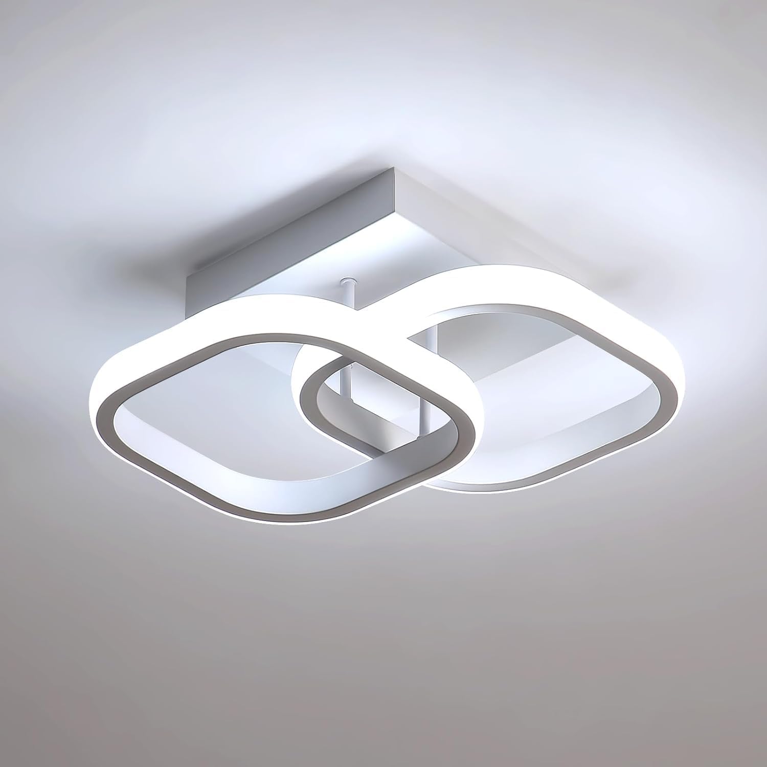 Niewielka, nowoczesna, kwadratowa lampa sufitowa LED z regulacją oświetlenia w trzech odcieniach bieli. Idealna do przedpokoju, sypialni lub salonu