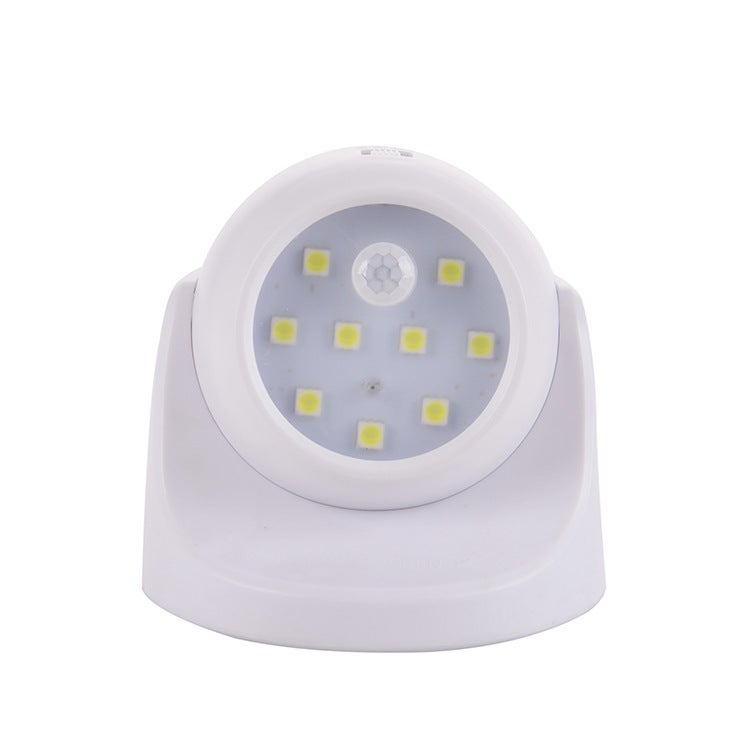 Bezprzewodowa lampa ścienna zewnętrzna zasilana bateryjnie z czujnikiem ruchu, oświetleniem LED, obrotem 360° i pochyleniem – biała