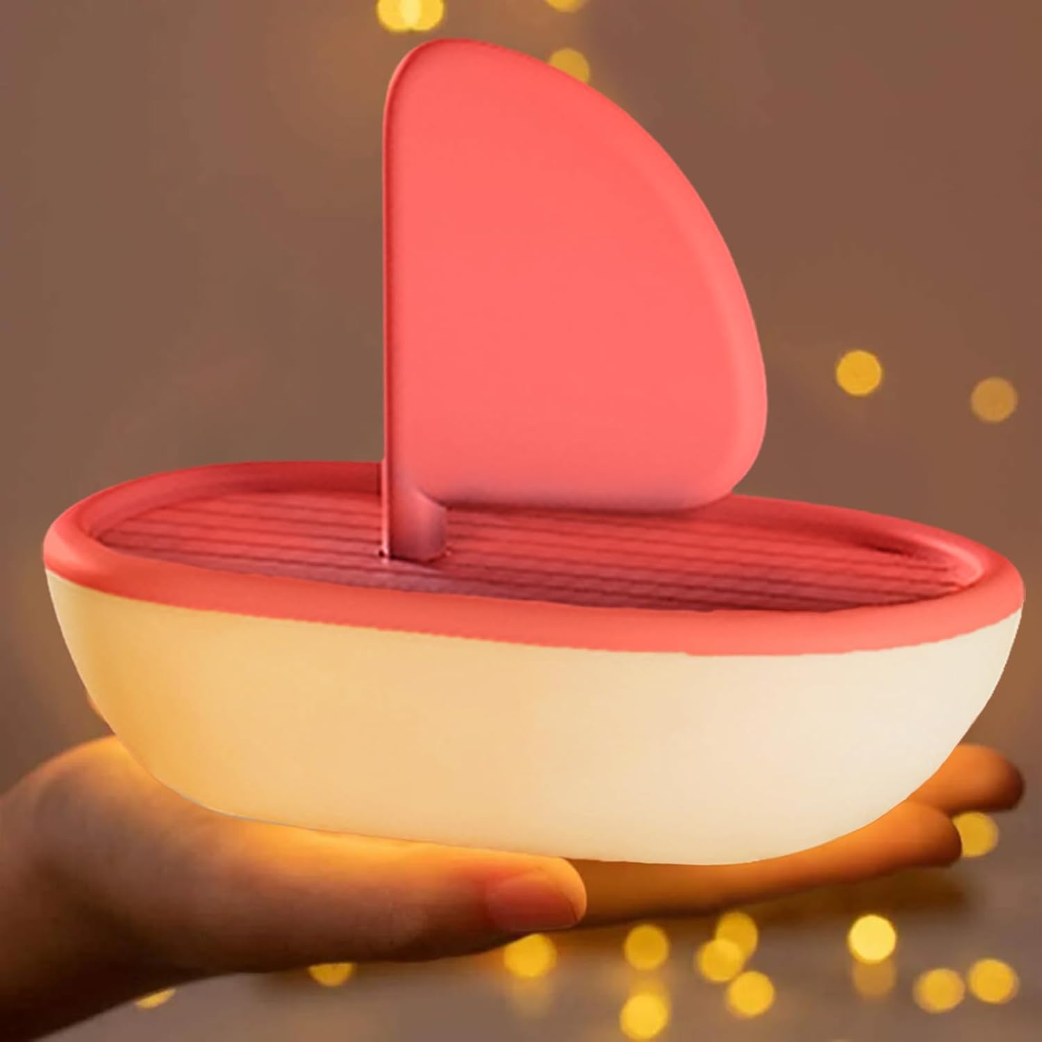 Muzyczna lampka nocna w kształcie żaglówki, lampka nocna wykonana z miękkiego silikonu, ładowana przez USB (pomarańczowa żaglówka).