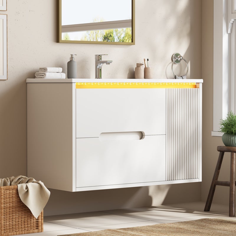 Szafka łazienkowa wisząca 81 cm – szafka łazienkowa z umywalką ceramiczną, falistymi frontami, oświetleniem LED i szufladami, styl nowoczesny – biała