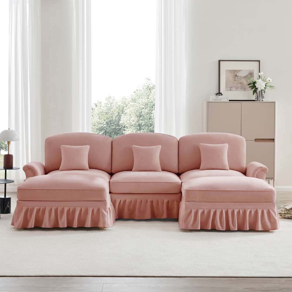 Modułowa sofa narożna U z podłokietnikami trąbkowymi, zdejmowanym fartuchem i wrzecionowymi nogami, z głębokim siedziskiem i pufem