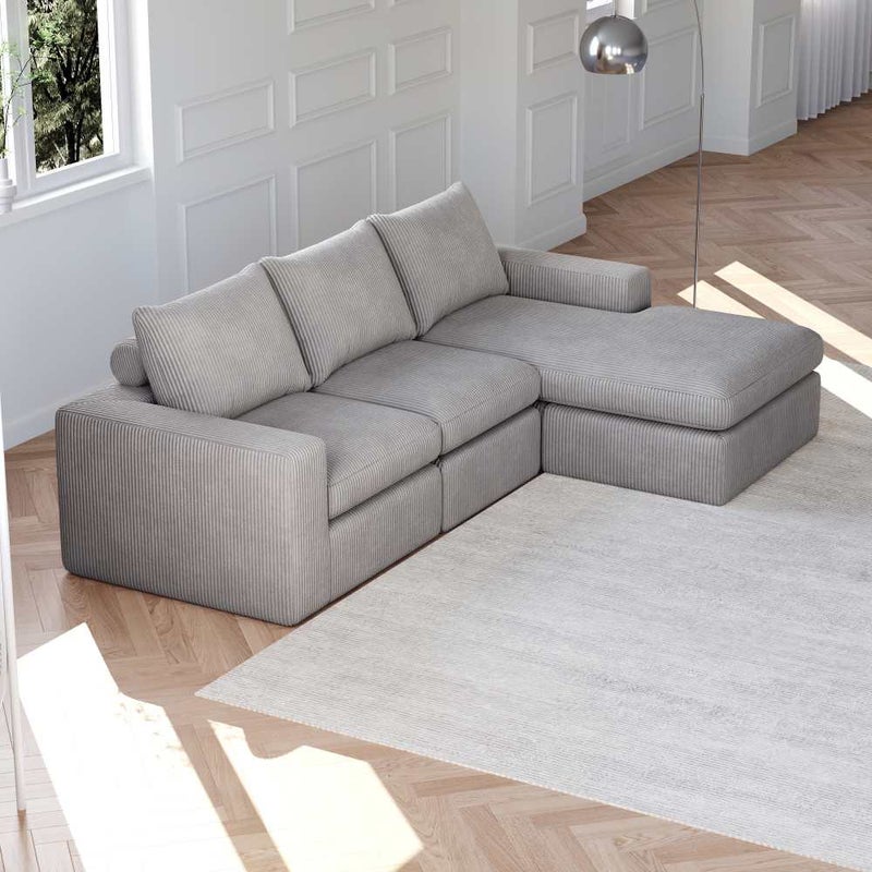Nowoczesna narożna sofa z kordu z szezlongiem i trzema ergonomicznymi poduszkami