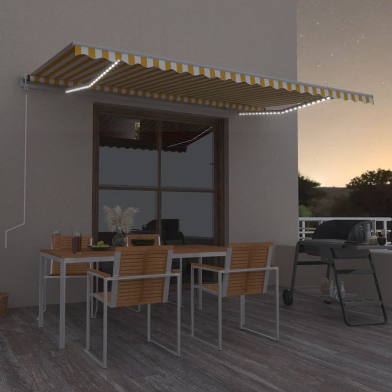 Ręcznie zwijana markiza z LED, 500 x 300 cm, żółto-biała vidaXL