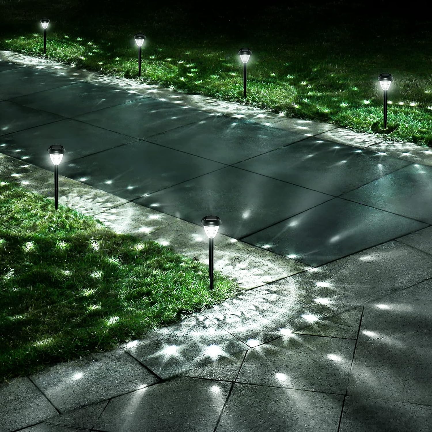 Zestaw 6 wodoodpornych lamp ogrodowych zasilanych energią słoneczną z automatycznym włącznikiem/wyłącznikiem i światłem LED.