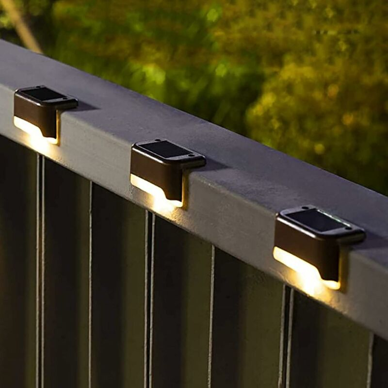Zestaw 4 lamp solarnych do użytku na zewnątrz, wodoodporne oświetlenie LED do oświetlania schodów, stopni, ogrodzeń i podwórek, ciepłe kolory