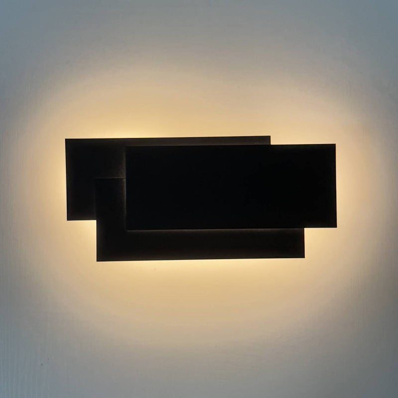 Nowoczesna lampa ścienna o mocy 12 W, idealna do sypialni, apartamentów, korytarzy i salonów. Ciepłe, białe światło, 3000 K, kolor czarny.