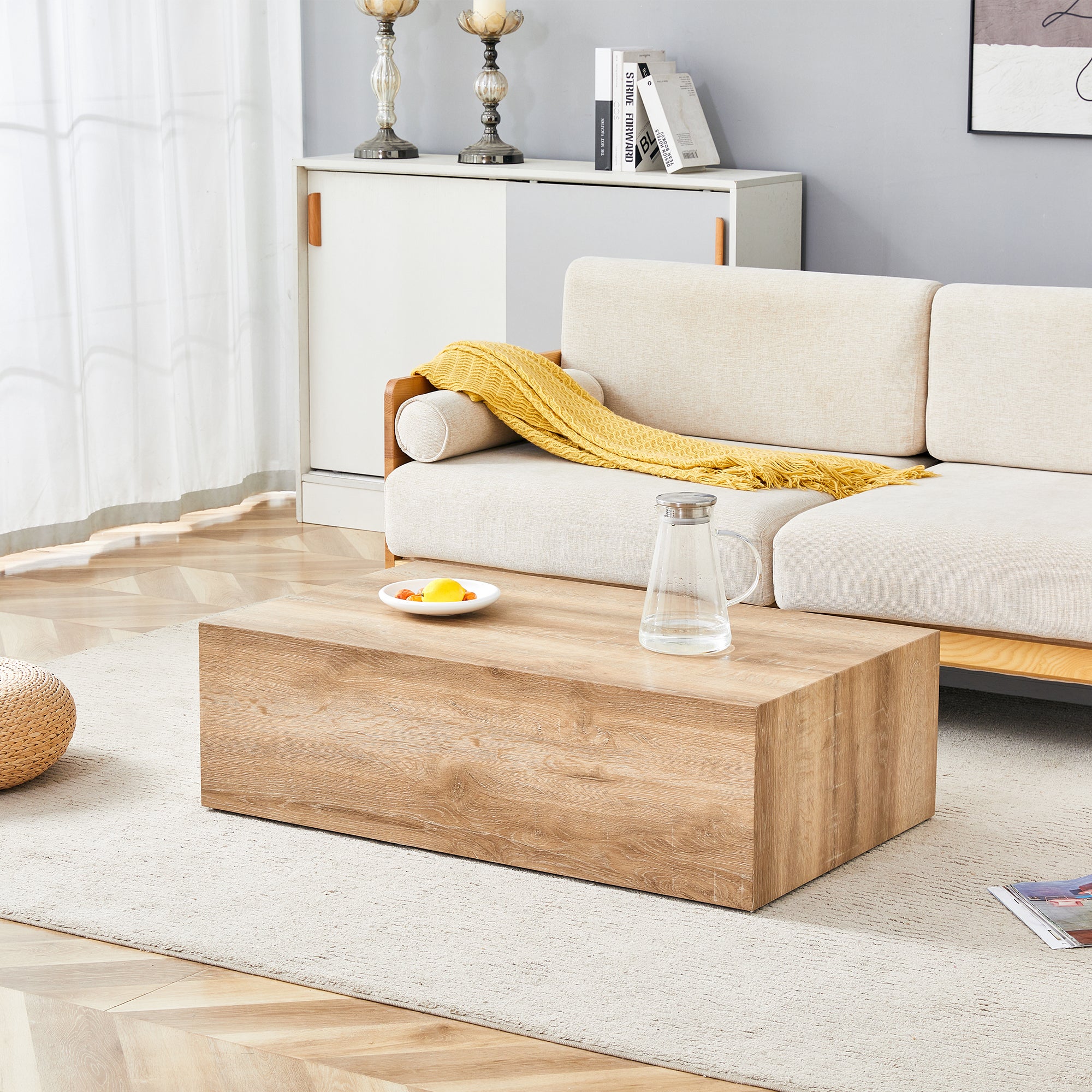 Lekki prostokątny stolik kawowy z fakturą słojów drewna. 90×50×30 cm, materiał MDF, nie wymaga montażu. Dół z antypoślizgowymi nóżkami