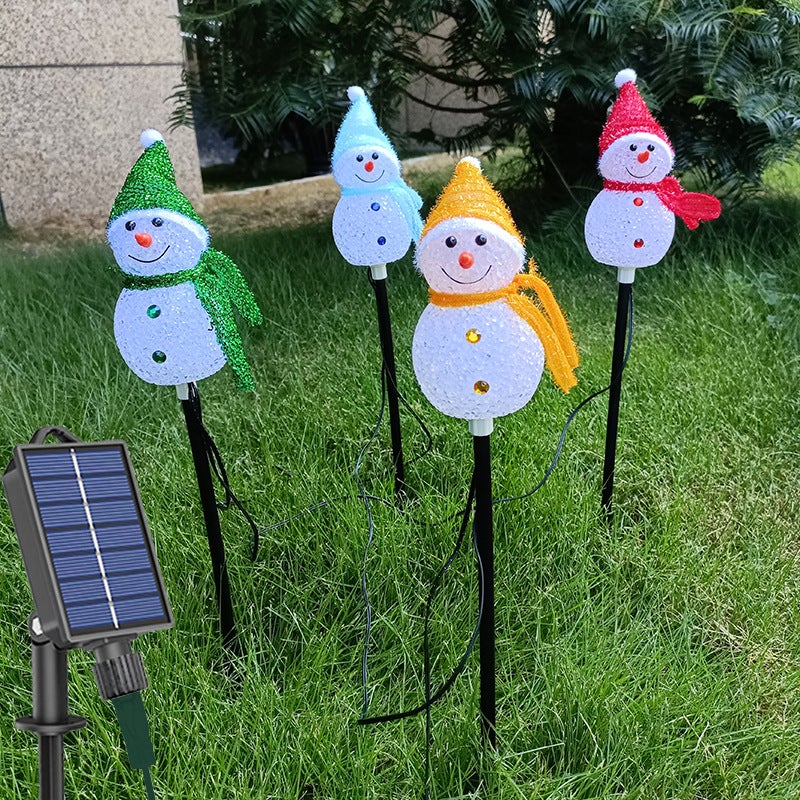 Solarne lampki ścieżkowe, dekoracja ogrodowa w kształcie bałwana zasilana energią słoneczną, 4-częściowe dekoracyjne lampki do trawnika