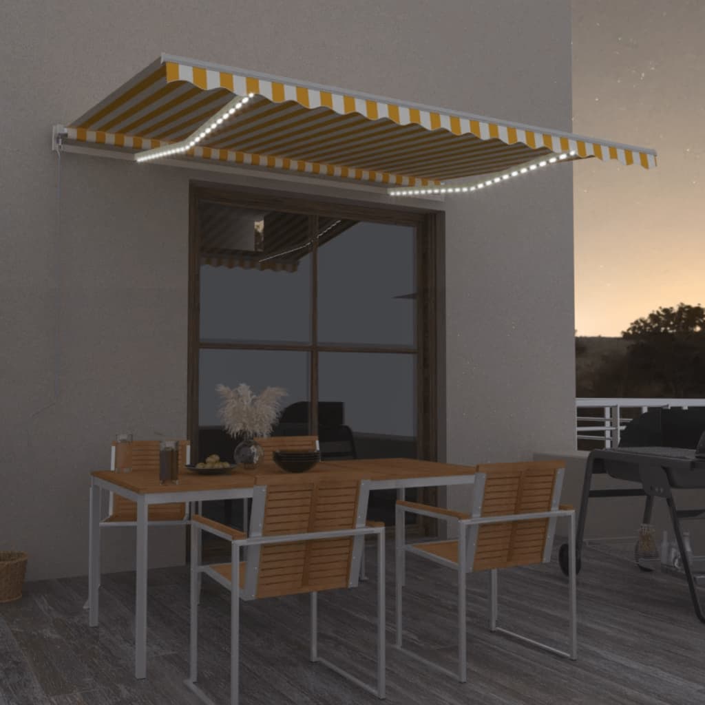 Ręcznie zwijana markiza z LED, 450x350 cm, żółto-biała vidaXL