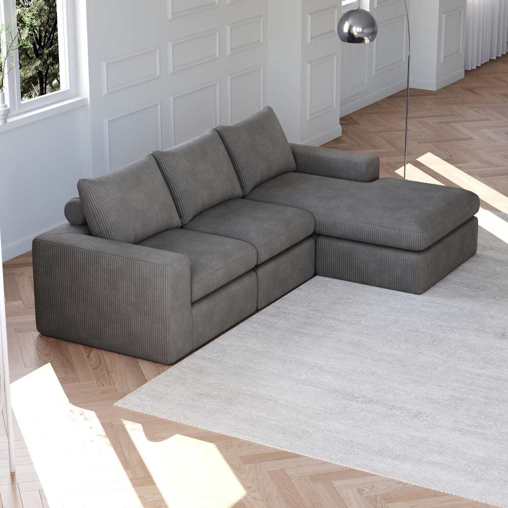 Nowoczesna narożna sofa z kordu z szezlongiem i trzema ergonomicznymi poduszkami