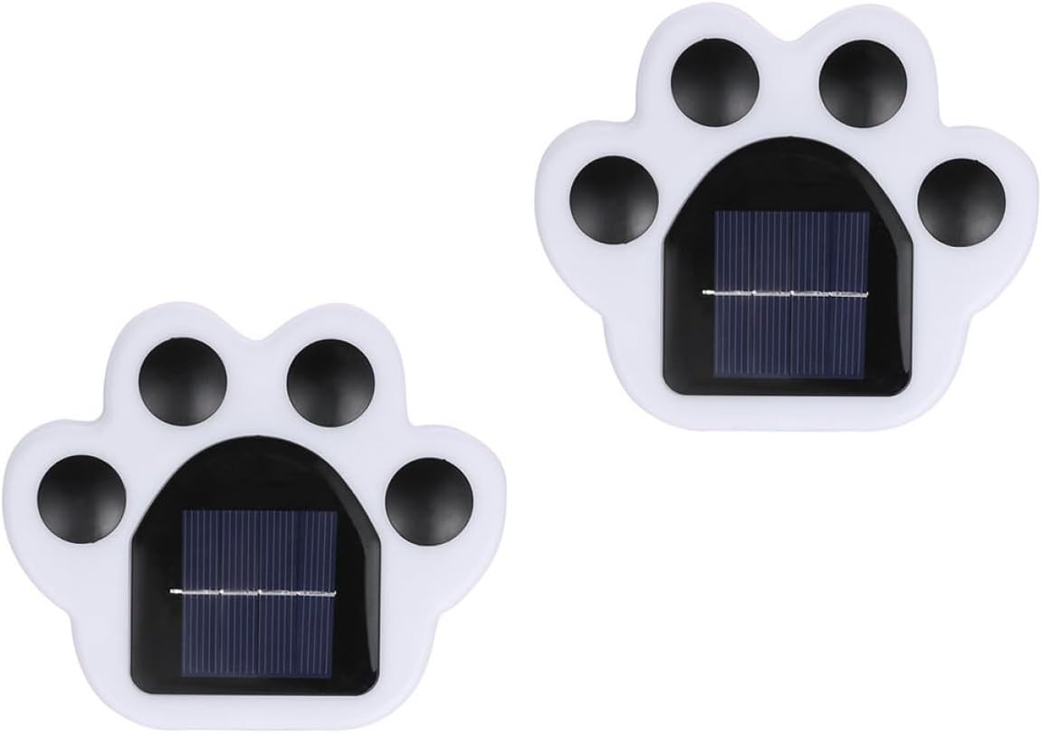 Zestaw dwóch dekoracyjnych lamp solarnych do ogrodu z białym światłem LED, do montażu na podłożu, idealny do ścieżek na dziedzińcach.